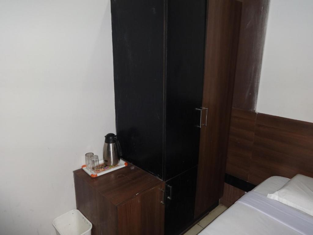 Hotel Miland Palace Μπουμπάνεσβαρ Δωμάτιο φωτογραφία