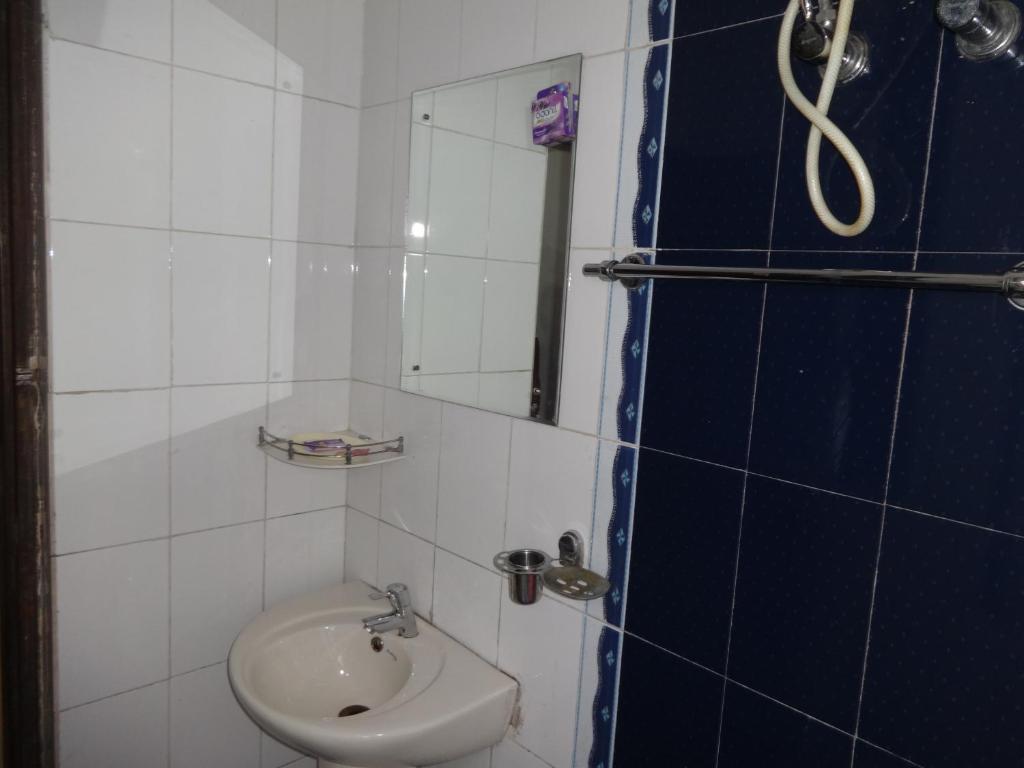 Hotel Miland Palace Μπουμπάνεσβαρ Δωμάτιο φωτογραφία